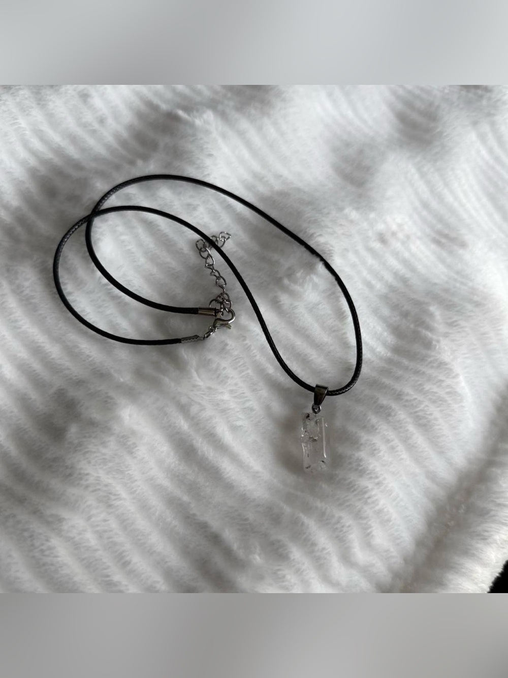 Black leather cord necklace with rose quartz crystal